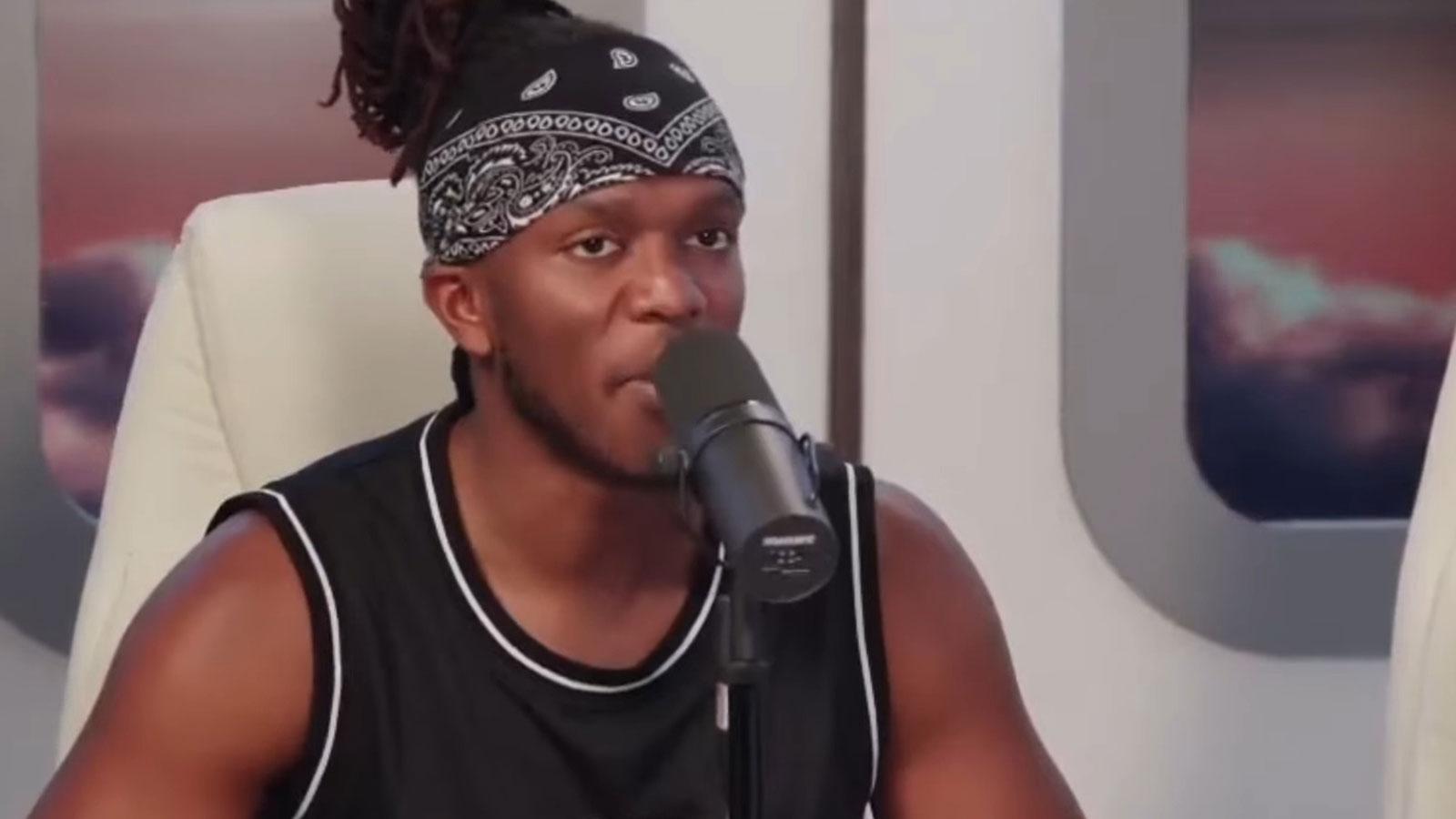 KSI speaking into microphone on SideCast set